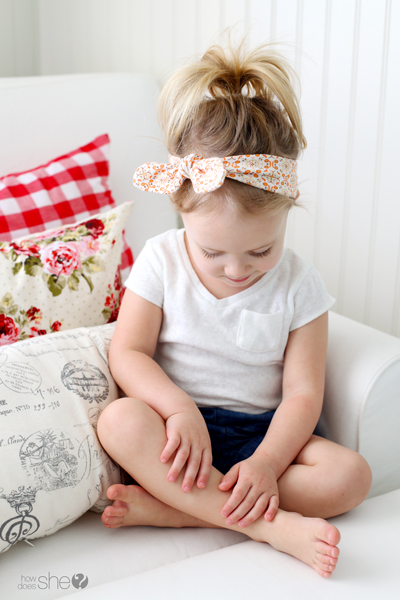little girl wearing knotted headband