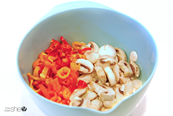 photo of sliced peppers and onions in bowl