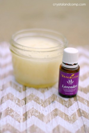 photo of homemade diaper rash cream and a bottle of lavender essential oil