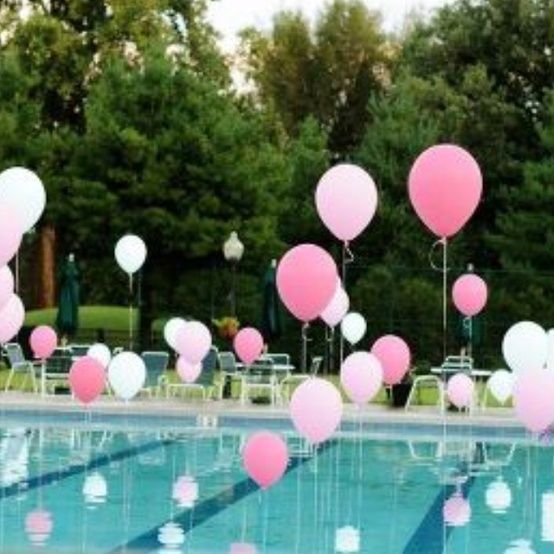 pool with floating balloons for tween, teen and sweet 16 parties