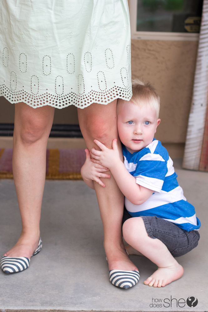 potty training methods - little boy hugging mom's leg