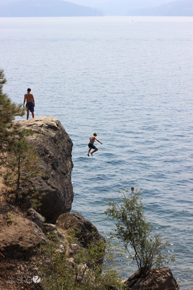 jumping off boulders into lake