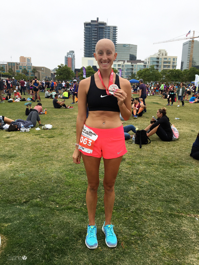 Young woman with bald head after running a marathon